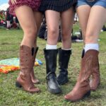 'Lamapalooza': bota cowboy vira tendência no 1º dia de festival e ajuda fãs a enfrentar lama após chuva em SP